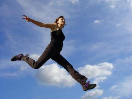 Woman confidently jumping