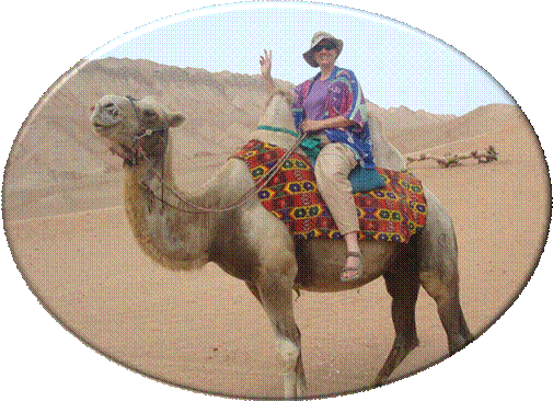 Photo of Ruth on a camel in Xinjiang Province, China